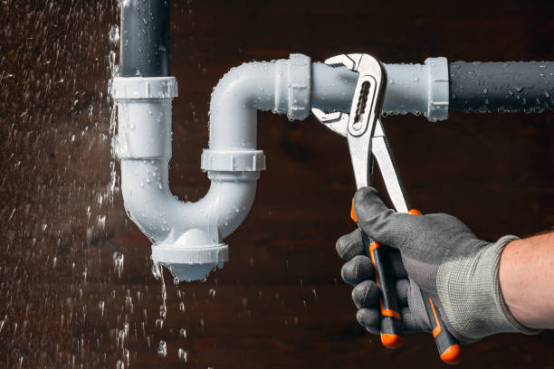 Professional Emergency Plumber technician working in Cochranville, PA